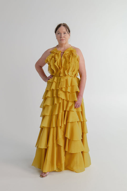 Aje Cleo golden chartreuse formal gown with cascading ruffles, sculptural bodice and full-length A-line skirt.