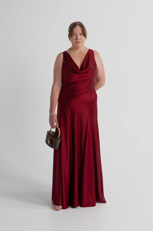 Anna Quan Gabrielle wine satin gown with draped cowl neckline and fluid floor-length silhouette, styled with the JW Pei Natalie dark brown top handle bag.