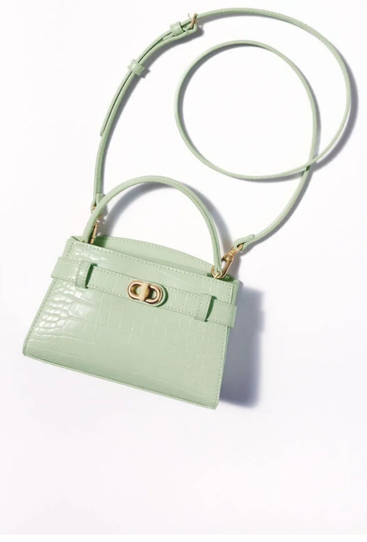 Charles & Keith Aubrielle mint croc-effect top handle bag styled with detachable shoulder strap. 