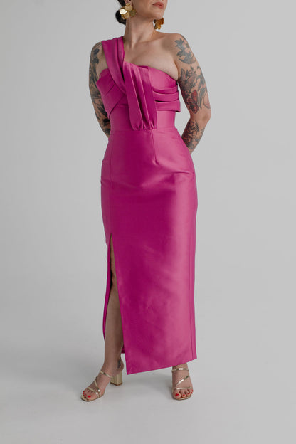 Eliya the Label Renata vivid magenta one-shoulder midi dress with layered folded bodice detailing, fitted column silhouette and side split.
