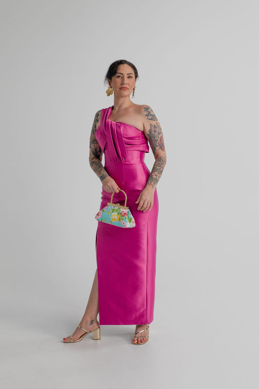 Eliya the Label Renata vivid magenta one-shoulder midi dress styled with the Olga Berg Audrey floral sequin top handle bag.
