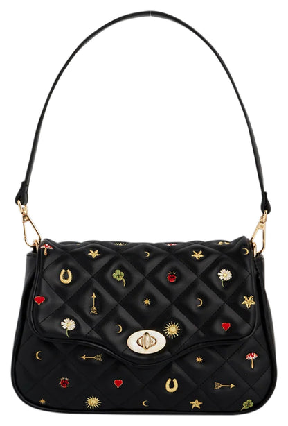 Fable England Mary black motif quilted clutch with embroidered details and short shoulder strap, front view. 
