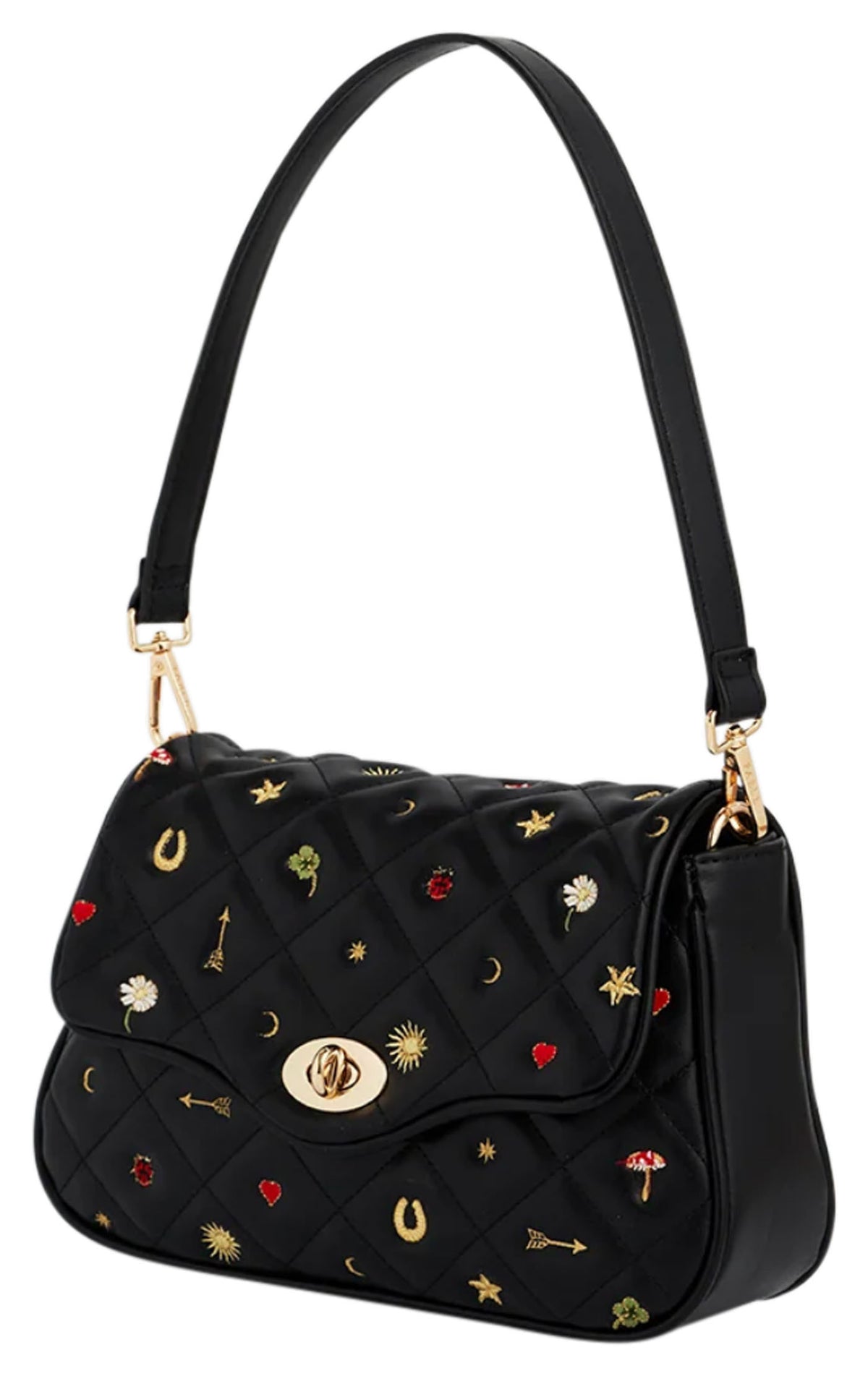 Angled side view of Fable England Mary black quilted bag showing the structured profile, embroidered motifs and shoulder strap. 
