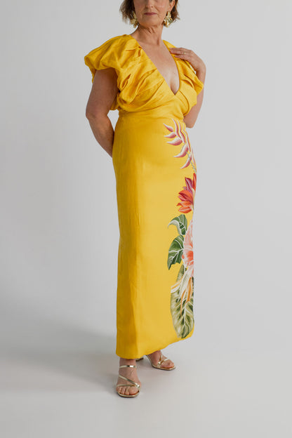 Front detail of the Farm Rio Spring Awakening Midi showing the deep V neckline, gathered ruffle sleeves and tropical floral print.
