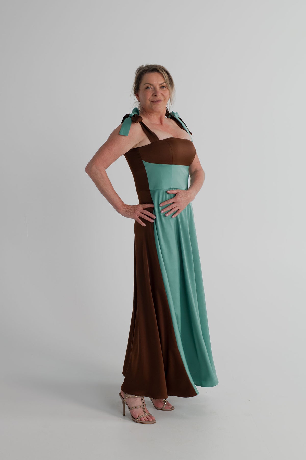 IQ Collection Carmen Midi in aqua and chocolate colour-blocking, featuring tie shoulder straps, a square neckline and flowing A-line skirt.

