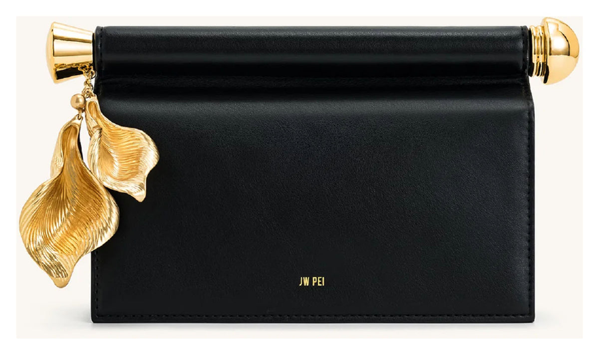 JW Pei Holly black embellished clutch with sculptural gold-tone leaf pendant and bar detail, front view. 
