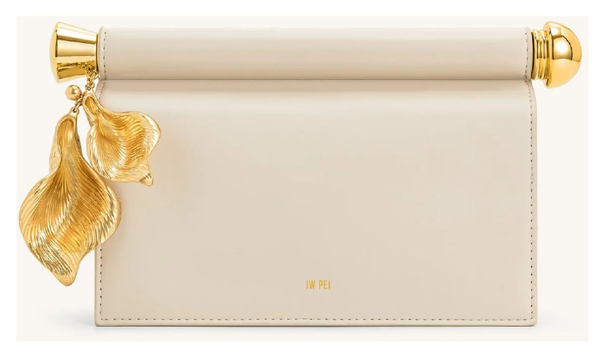 JW Pei Holly cream embellished clutch with sculptural gold-tone leaf pendant and bar detail, front view. 

