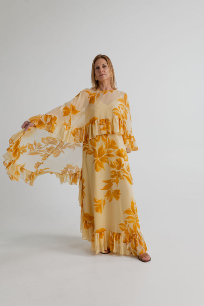 Monsoon Joanna Ruffle Cape Maxi showing the sheer floral cape extended to highlight the draped shape and ruffled edging.
