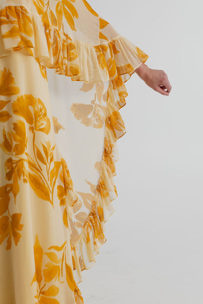 Close-up of the Monsoon Joanna Ruffle Cape Maxi showing the sheer floral chiffon, cascading cape ruffles and soft layered trim.

