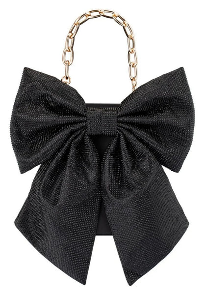 Olga Berg Drew black crystal bow bag with oversized crystal bow and long gold-tone chain strap, front view. 
