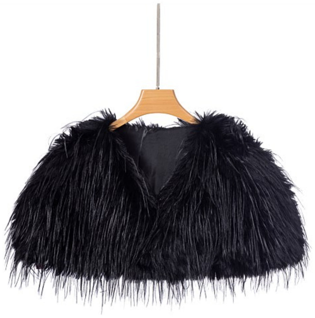 The Two Mrs Grenvilles black faux fur shrug on a hanger showing the cropped cape-style shape, open front and long-pile faux fur finish. 
