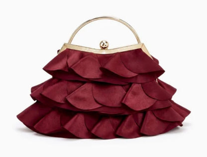 Verano Hill Colette burgundy ruffle bag with layered fabric petals and gold-tone top handle, front view. 
