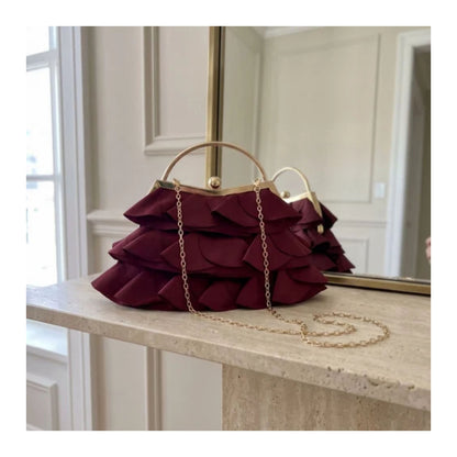 Verano Hill Colette burgundy ruffle bag with detachable gold-tone chain strap. 
