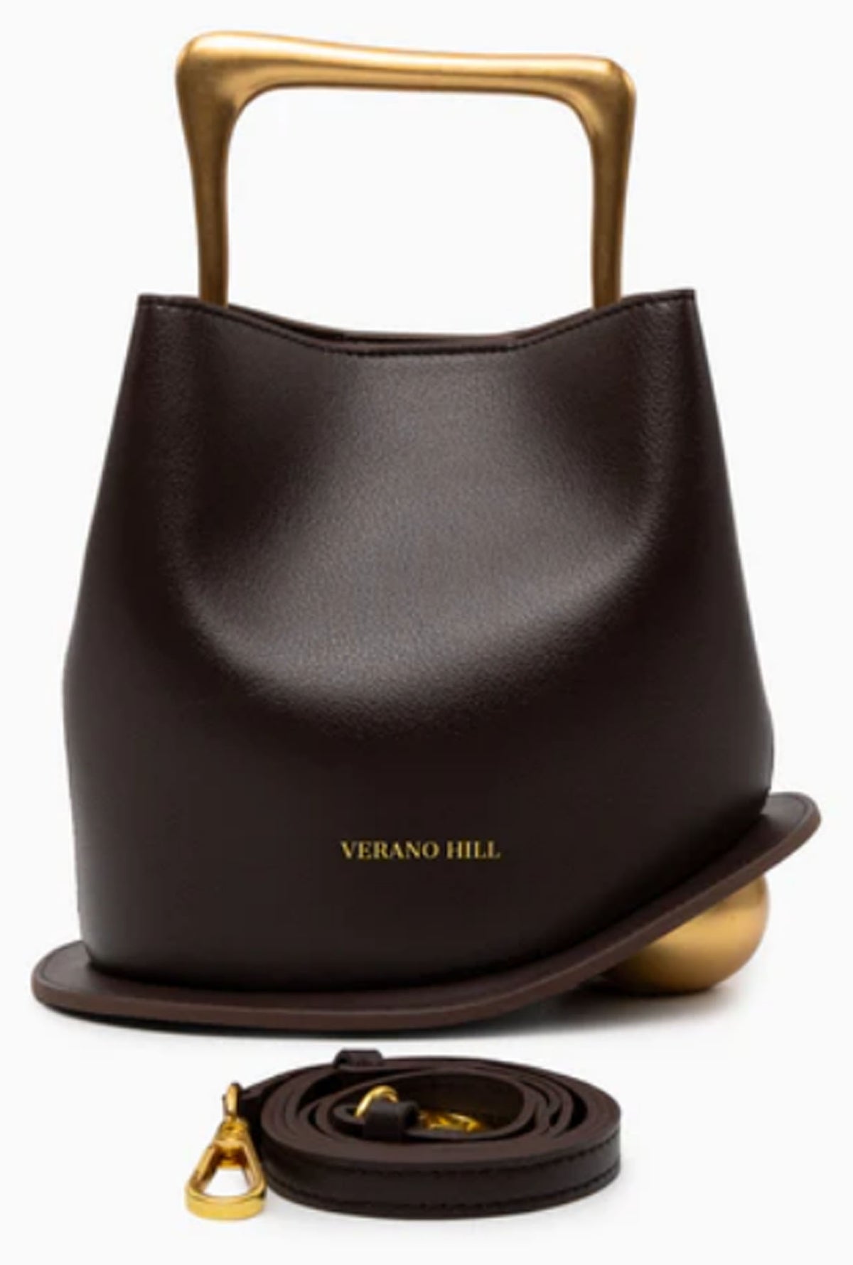 Verano Hill Vienna dark brown handbag with detachable shoulder strap and sculptural gold-tone top handle. 

