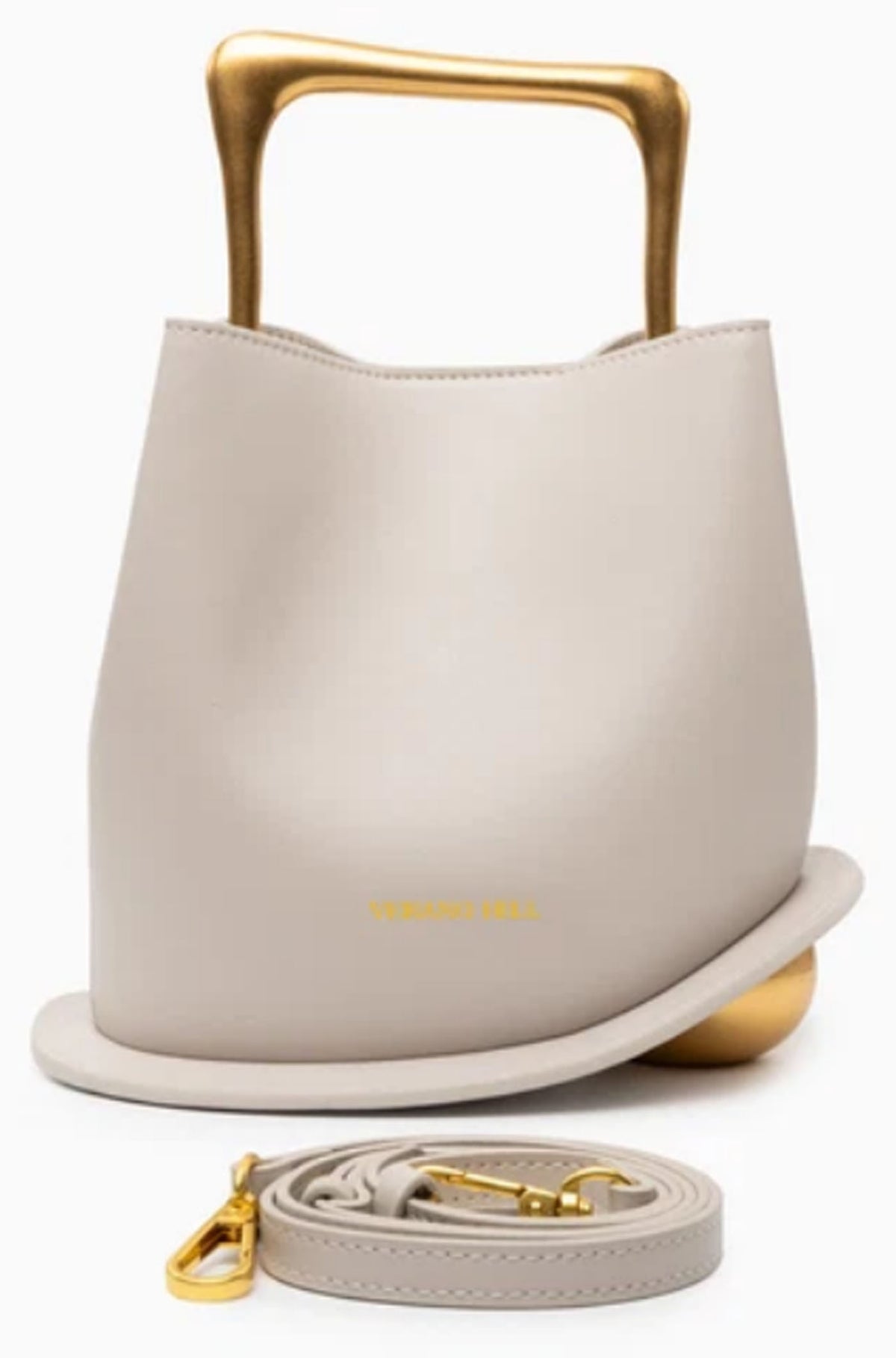 Verano Hill Vienna greige handbag with detachable shoulder strap and sculptural gold-tone top handle. 
